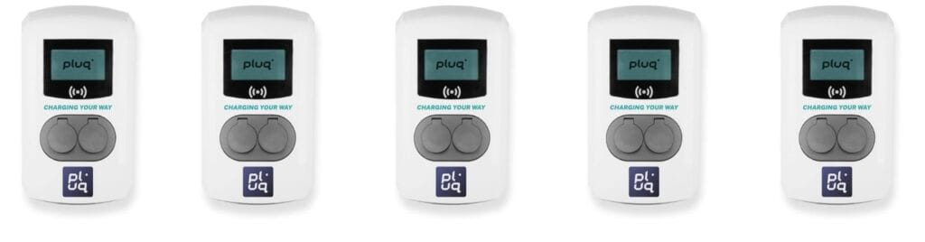 Five identical white EV charging stations for electric cars, each with digital screens displaying pluq and two round socket covers below, are evenly spaced on a white background—perfect for free loading stations and easy charging.