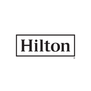 The Hilton logo features the word Hilton in bold, black serif font enclosed within a thin rectangular border on a white background.